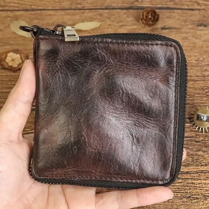 Portefeuille court vintage pour homme simple en cuir véritable doux avec fermeture éclair multi-fonctions porte-monnaie pour homme en cuir de vachette naturel petit sac d'argent avec poche à moraillon
