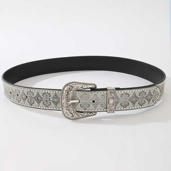 Ceinture vintage argentée avec boucle en métal sculpté de style western