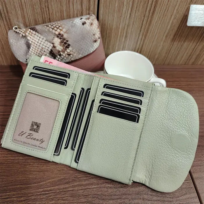 Nouveau 10 couleurs motif serpent en cuir de vache court portefeuille femmes mode Python véritable peau de vache Tri-fold porte-carte sac à main dames