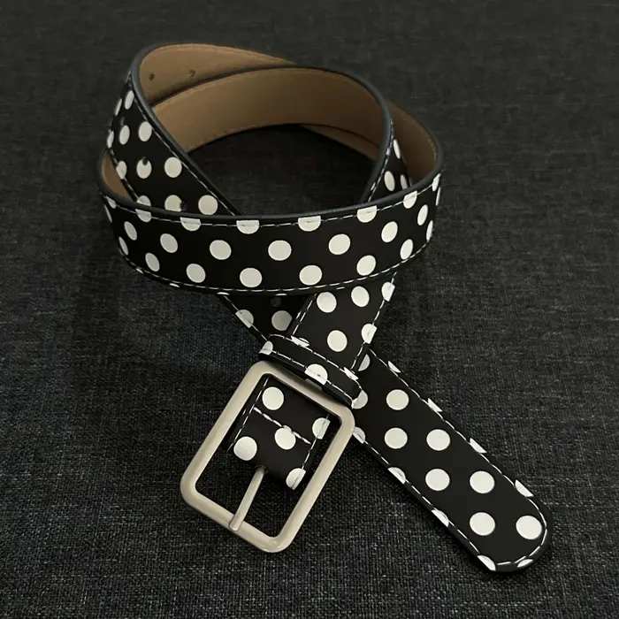 Ceinture noire à pois blancs