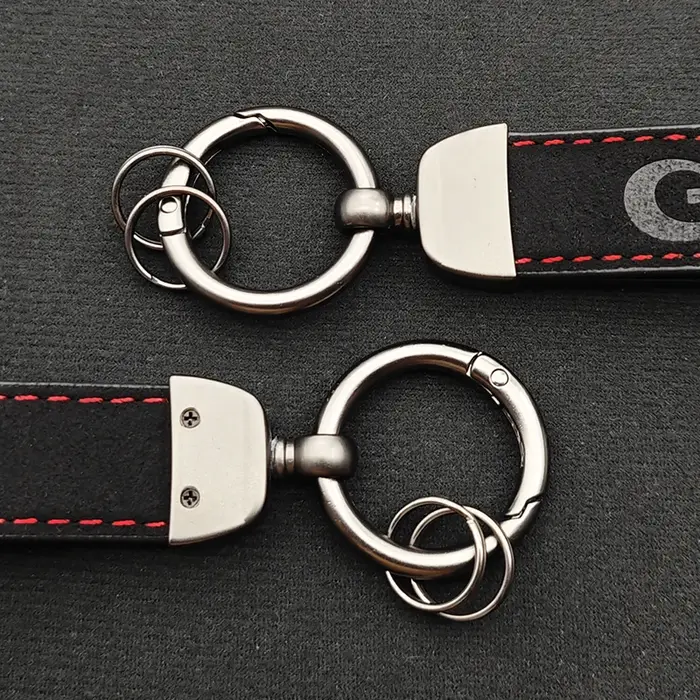 Porte-clés en cuir de luxe de haute qualité pour hommes et femmes