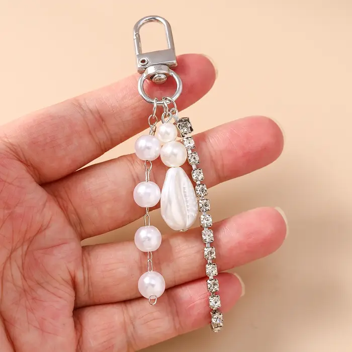 Joli porte-clés en forme de coquille de perles pour femmes et filles