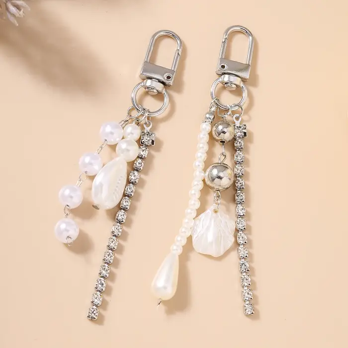 Joli porte-clés en forme de coquille de perles pour femmes et filles