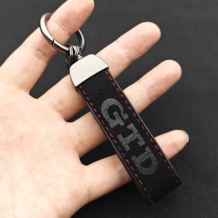 Porte-clés en cuir de luxe de haute qualité pour hommes et femmes