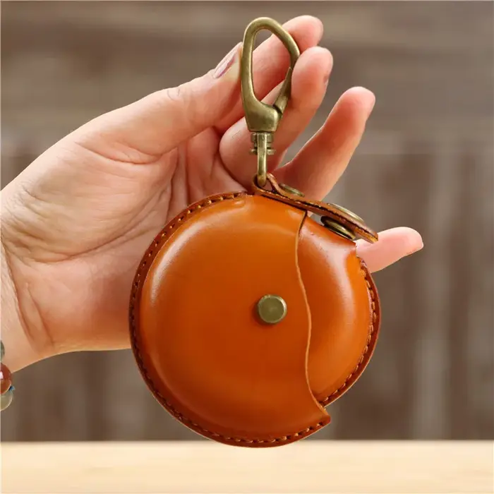 Petite bourse ronde en cuir véritable
