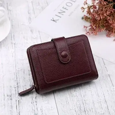 Mini porte-monnaie en cuir avec moraillon pour femme