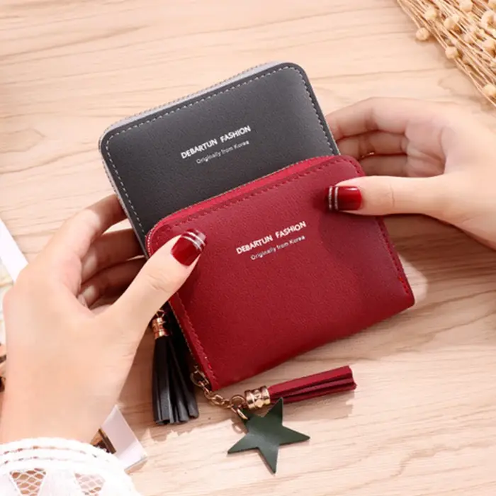 Petit portefeuille en cuir PU avec pompon pour femme