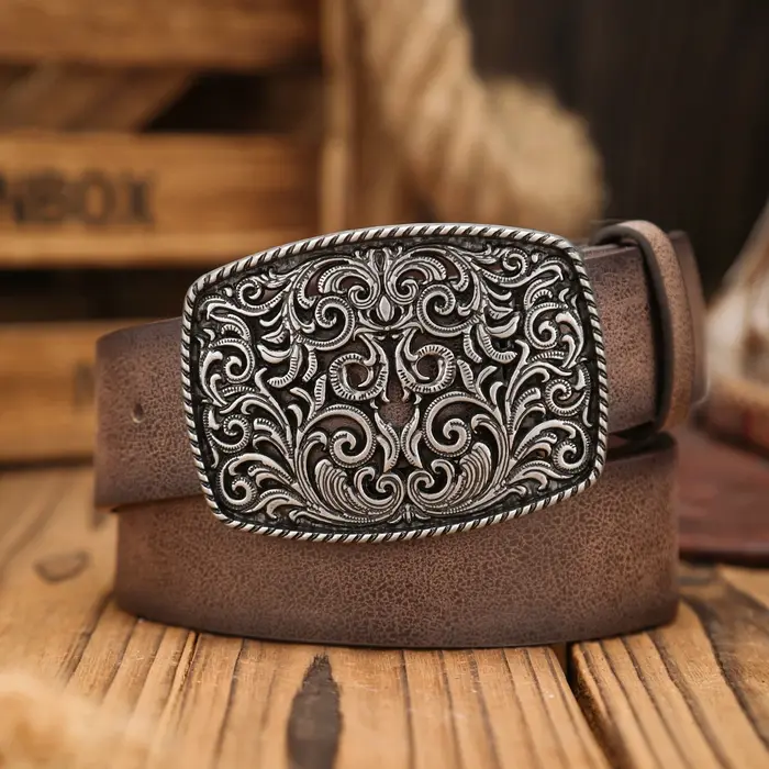 Une ceinture en PU à boucle occidentale adaptée aux hommes et aux femmes