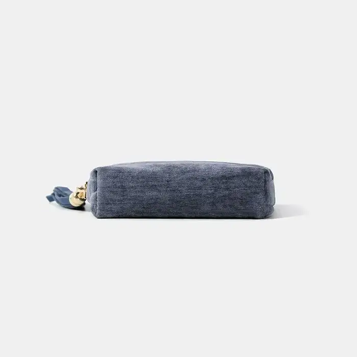 Mini porte-monnaie en velours avec fermeture éclair dorée et pompon