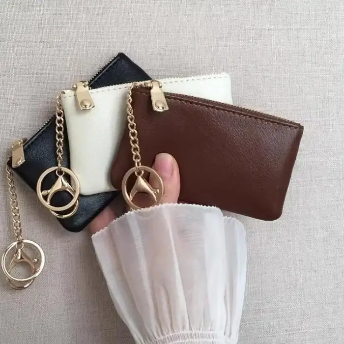 Mini porte-monnaie en cuir PU avec porte-clés doré et fermeture éclair lisse, parfait pour un usage quotidien, pour transporter cartes, argent, clés et petits objets.