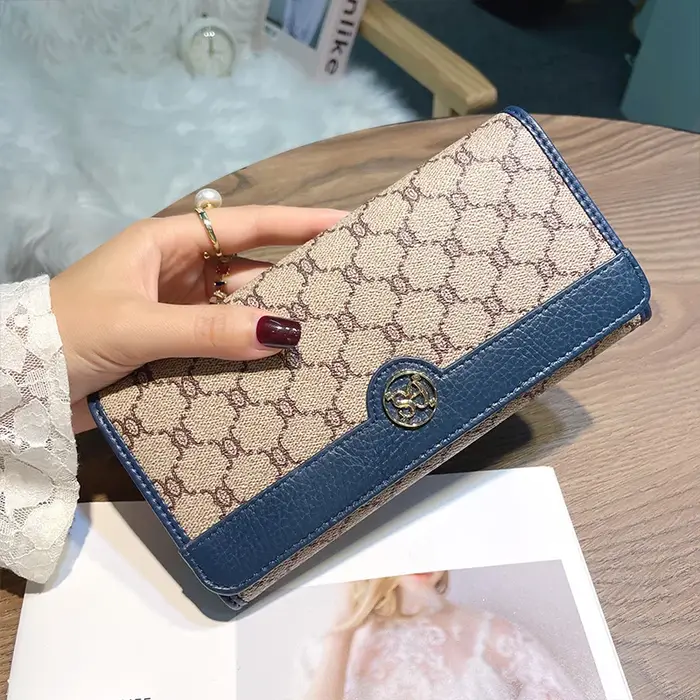 Portefeuille de luxe en cuir véritable pour femme, sac à main long de style de marque, portefeuille en arc de triomphe, pocommuniste pour femme, porte-monnaie en cuir de veau, excellent