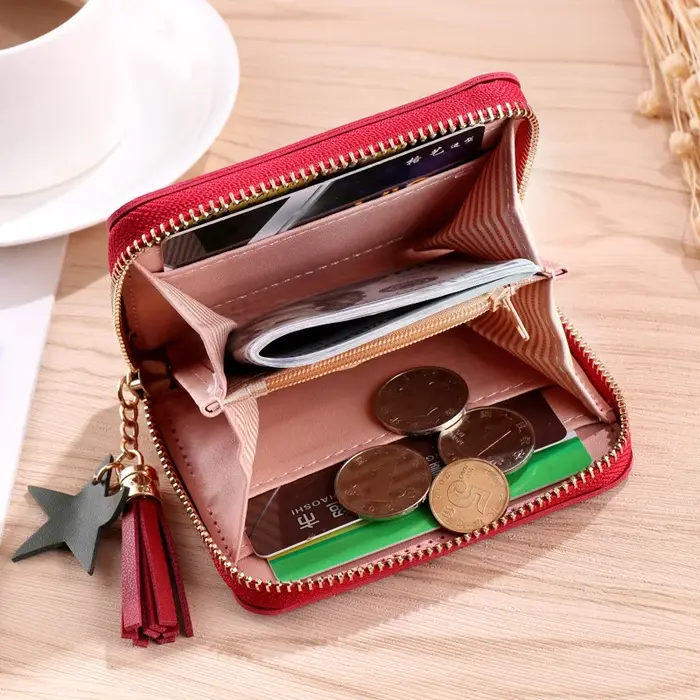 Petit portefeuille en cuir PU avec pompon pour femme