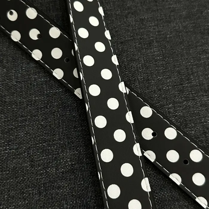 Ceinture noire à pois blancs