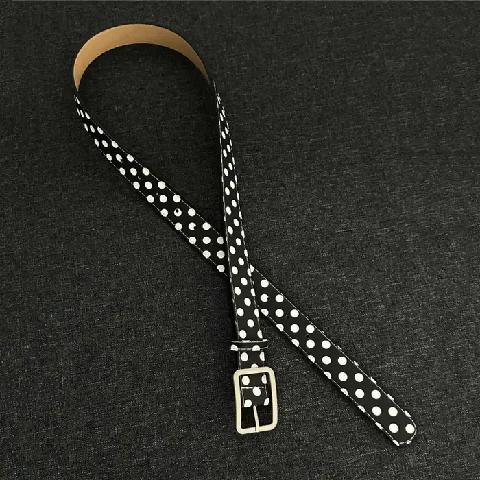 Ceinture noire à pois blancs