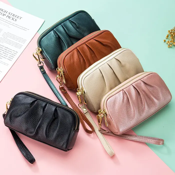 Nouveau 2025 polyvalent dame portefeuille contraste couleur porte-clés chaîne Style véritable couche supérieure en cuir de vache fermeture éclair pièces de monnaie poche sac à main