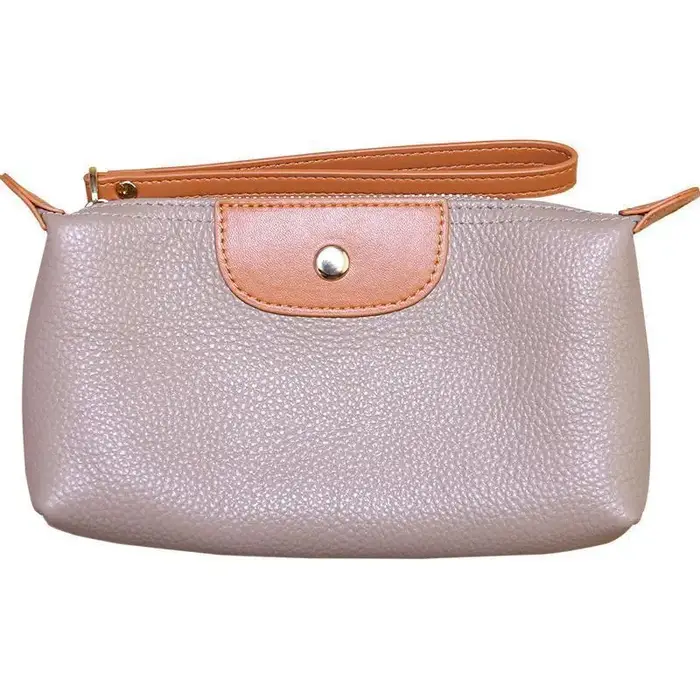 Le nouveau portefeuille pour femme en cuir souple et tendance avec des couleurs contrastées est un sac à main portable