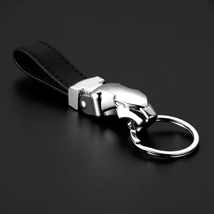 Style de voiture luxe tête de léopard en cuir véritable porte-clés