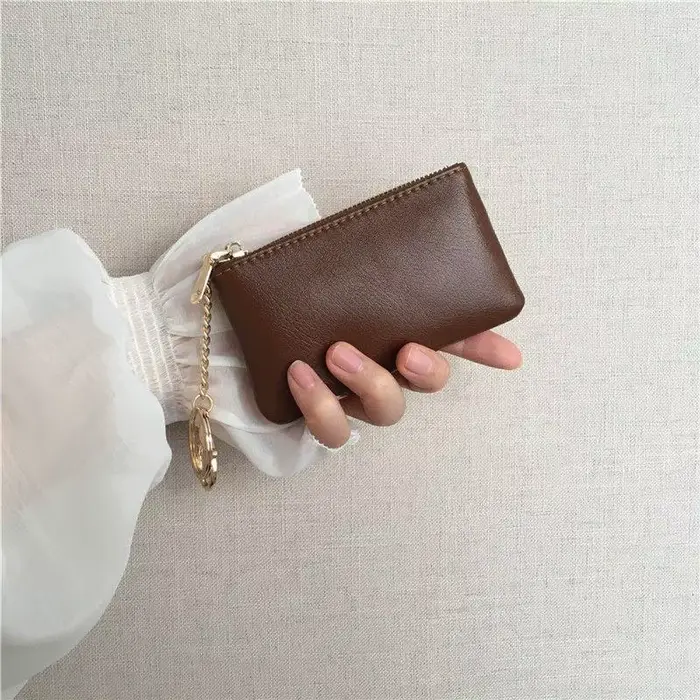 Mini porte-monnaie en cuir PU avec porte-clés doré et fermeture éclair lisse, parfait pour un usage
