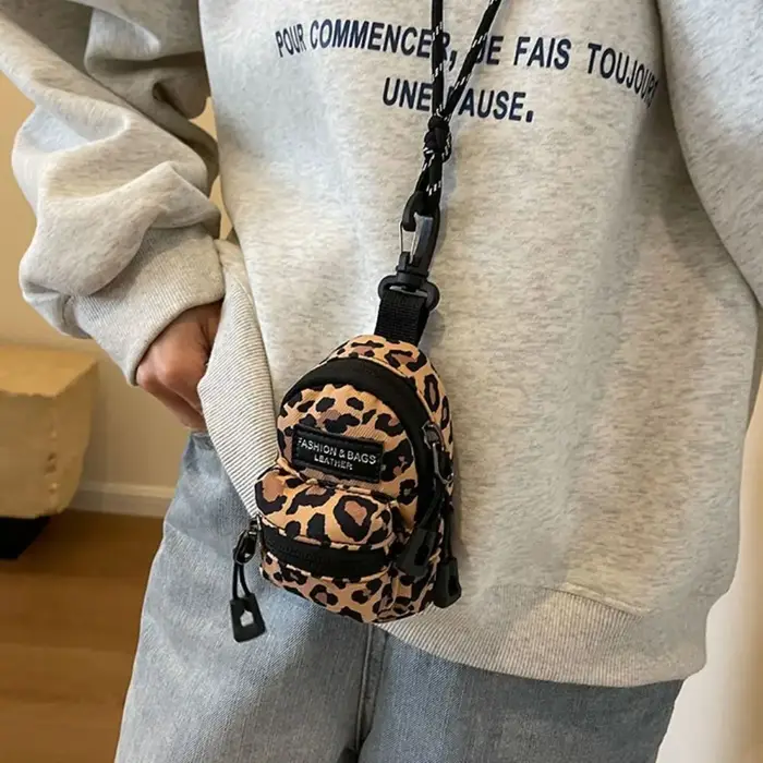 Pochette pour pièces de monnaie imprimé léopard