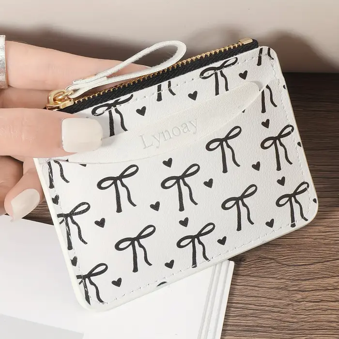 Portefeuille ultra-fin à fermeture éclair pour femme : porte-cartes rose avec nœud en forme de cœur