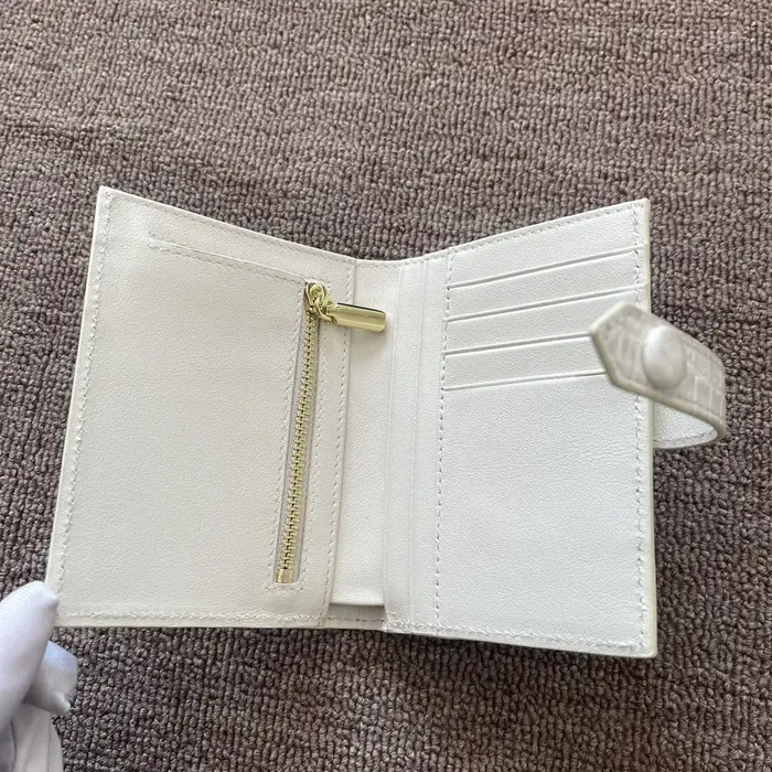 Portefeuille pour femme en cuir de crocodile blanc de l'Himalaya